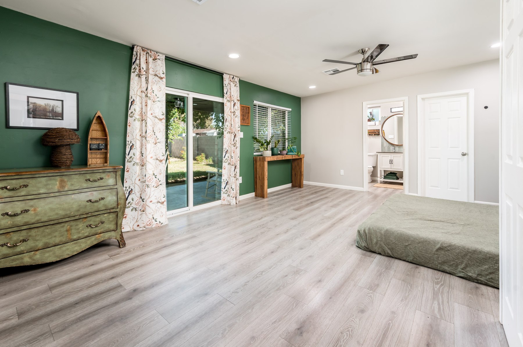 Primary suite opening to the patio